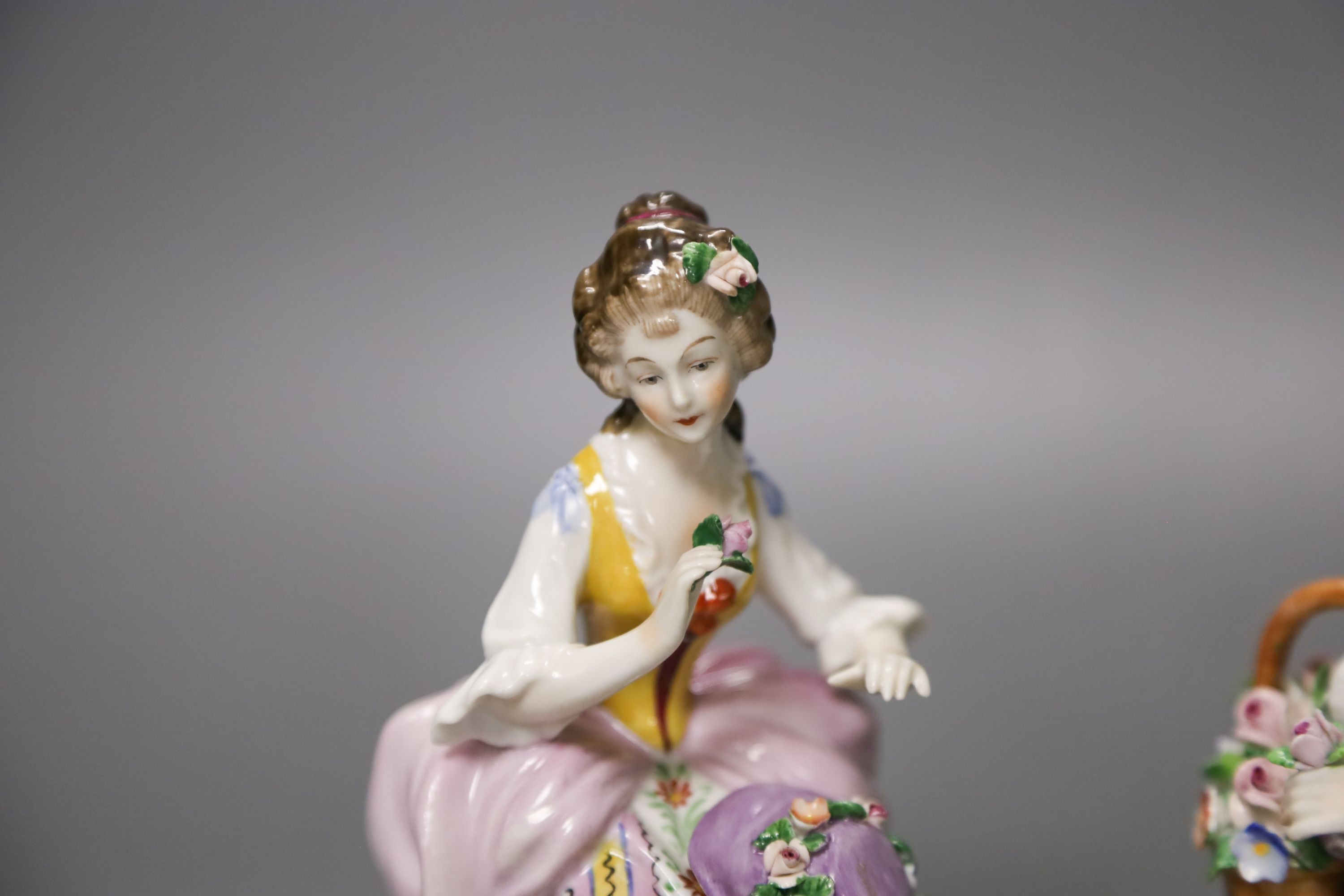 Two pairs of Continental porcelain figures, 35cm